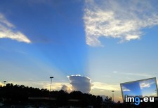 Tags: cloud, cuts, halves, rays, sun (Pict. in My r/MILDLYINTERESTING favs)