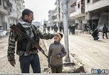 Tags: child, fighter, isis, streets, syria, walks (Pict. in My r/PICS favs)