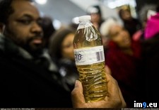 Tags: bottle, flint, holds, michigan, office, pastor, protests, rick, thursday, water (Pict. in My r/PICS favs)